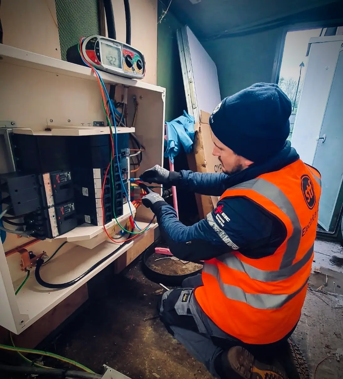 STF Electrical Ltd electrician conducting rigorous testing on a commercial electrical installation in Liverpool.